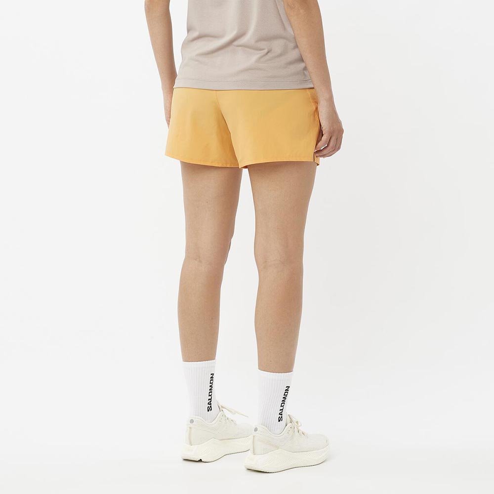 Spodenki Salomon Shakeout Core 2 In 1 4'' W Jasnopomarańczowe
